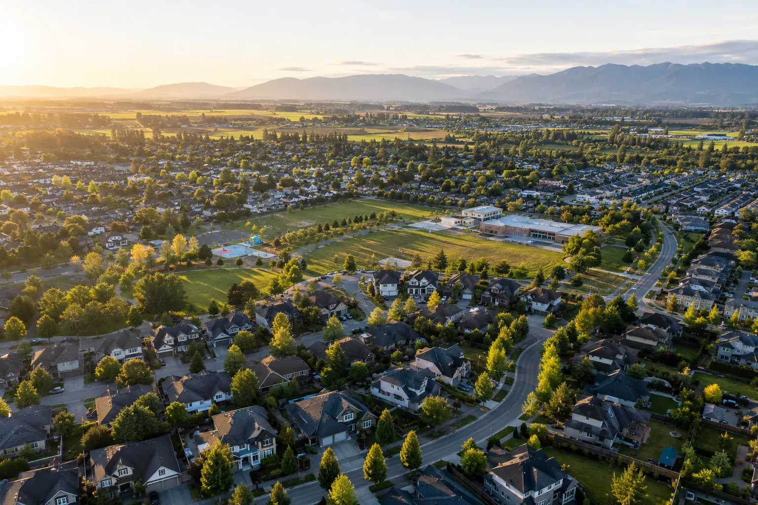 Parents checking school boundaries while comparing Abbotsford neighbourhoods